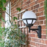Traditional Globe Outside Wall Light Mounted on a Garden Wall 