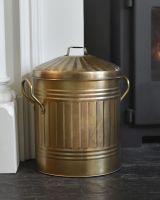 Traditional Gold Log Bucket Near The Fire Traditional Gold Log Bucket Near The Fire