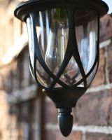 Close-Up of Traditional Ornate "Clear Glass" Victorian Top Fix Wall Lantern