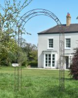 Traditional "Othona" Garden Rose Arch in Use in the Back garden Traditional "Othona" Garden Rose Arch in Use in the Back garden
