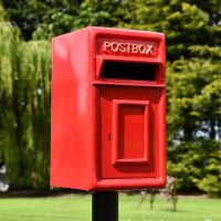 Close-up of the Traditional Red & Gold Post Box