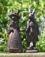 Victorian Rabbit Couple Garden Statues in Situ in the Garden 