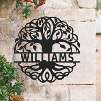Tree of Life Steel Monogram Steel House Name Sign on situ on a Stone Wall Tree of Life Steel Monogram Steel House Name Sign on situ on a Stone Wall