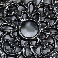 Ornate Design on the Black Heavy Duty Cast Iron Round Trivet