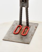 Tuppence the Clown Upcycled Metal Ornament close up of base made from chain links Tuppence the Clown Upcycled Metal Ornament close up of base made from chain links