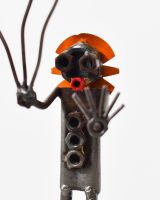 Tuppence the Clown Upcycled Metal Ornament close up of head made from recycled nuts Tuppence the Clown Upcycled Metal Ornament close up of head made from recycled nuts