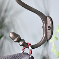 Close up of mounting plate and acorn hook 