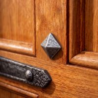 The Large Pewter Pyramid Door Stud on a Heavy Wooden Door - Digital Illustration The Large Pewter Pyramid Door Stud on a Heavy Wooden Door - Digital Illustration