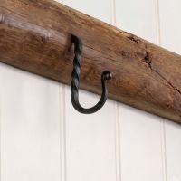 The 38mm Blacksmith Beeswax Cup Hook on a Wooden Timber Beam in a Kitchen Cottage - Digital Illustration The 38mm Blacksmith Beeswax Cup Hook on a Wooden Timber Beam in a Kitchen Cottage - Digital Illustration