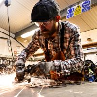 Monogram Fireguard Being Handcrafted in the Workshop
