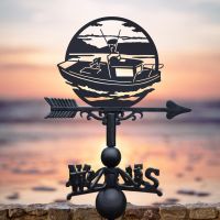 Traditional Sailing Boat Weathervane in Coastal Setting
