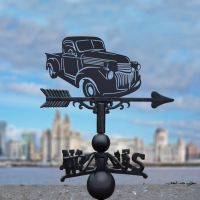 1944 Chevrolet Truck Weathervane with Cityscape in Background