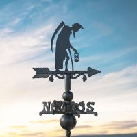 Old Father Time on Miniature Weathervane at Dusk Old Father Time on Miniature Weathervane at Dusk