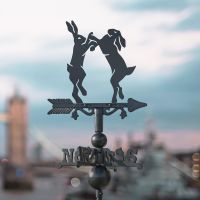 Boxing Hares Miniature Weathervane on Top of a Roof