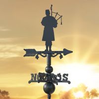 Scottish Bagpiper on Miniature Weathervane at Sunset