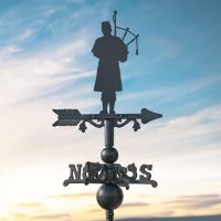 Scottish Bagpiper on Miniature Weathervane at Dusk