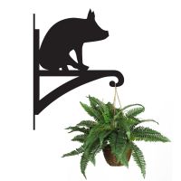 Pig Hanging Basket Bracket Holding a Plant