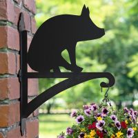 Pig Hanging Basket Bracket in Situ on a Brick Wall