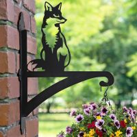 Sitting Fox Hanging Basket Bracket in Situ on a Brick Wall