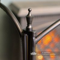 Urn Style Finials on the Top of the Fireguard