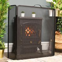 Traditional Three Fold Winged Fire Guard in Front of log burner