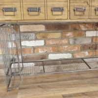 Close up of light tan wood and metal frame 