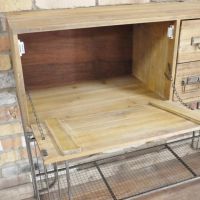 Close up of drawbridge style drawer 