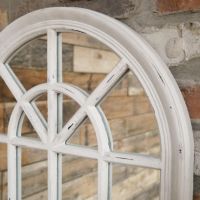 Close up of Aged White Arched Mirror 