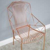 Side view of copper armchair 