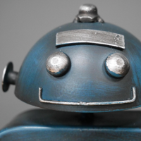 Close up of face on Ro-bot Blue Square Clock