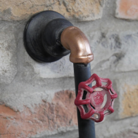 Close up of Water Pipe Wall Mounted Bracket 