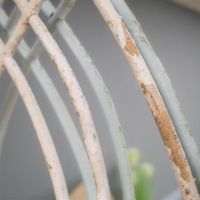 Close up of Scroll Metal Detailing on Mirror 