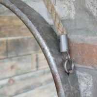 Close-Up of Frame and Rope on Circle Mirror Close-Up of Frame and Rope on Circle Mirror