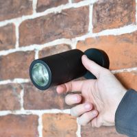 Black Downlight with hand for scale