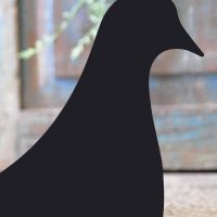 Close-up of the Black Finish on the Pigeon Iron Door Stop Close-up of the Black Finish on the Pigeon Iron Door Stop