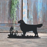Golden Retriever Iron Door Stop in Front of a Rustic Blue Door