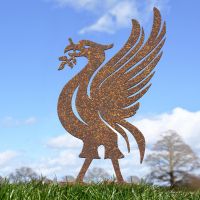 Rustic Liver Bird Silhouette Ornament in the Garden