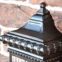 Close up of top finial and decorative trim 