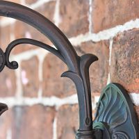 Close up of swan neck arm bracket 