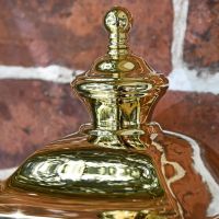 Close-up of the Polished Brass Finial on the Top of the Lantern Close-up of the Polished Brass Finial on the Top of the Lantern
