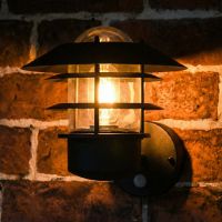 Digital illustration of illuminated "Skive" Black Contemporary Wall Light with PIR Sensor 