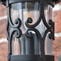 Close up of scroll work on "Ebberton" wall light 