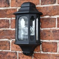 Black Moorside Traditional Flush wall lantern on brick wall