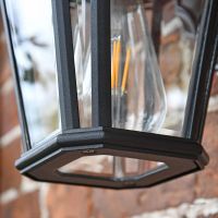 Close up of bulb and detailing on wall lantern 