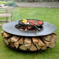 Ring Barbecue Firepit with Log Storage and a Swing Arm Barbecue Rack Cooking View 1 Ring Barbecue Firepit with Log Storage and a Swing Arm Barbecue Rack Cooking View 1