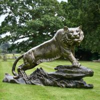 Gold & Black Tiger Sculpture on Plinth in full view