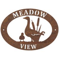 Goose & Gosling Iron Oval House Sign on a White Wall Goose & Gosling Iron Oval House Sign on a White Wall