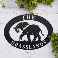 Elephant Iron Oval House Sign in Use Outdoors Elephant Iron Oval House Sign in Use Outdoors