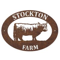 Highland Cow Iron Oval House Sign on a White Wall Highland Cow Iron Oval House Sign on a White Wall