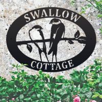 Swallow Oval House Name Sign on Wall 